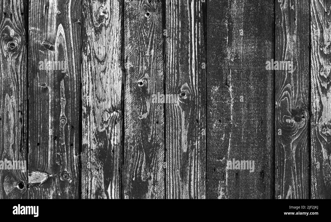 Old black rural wooden wall, background photo texture Stock Photo
