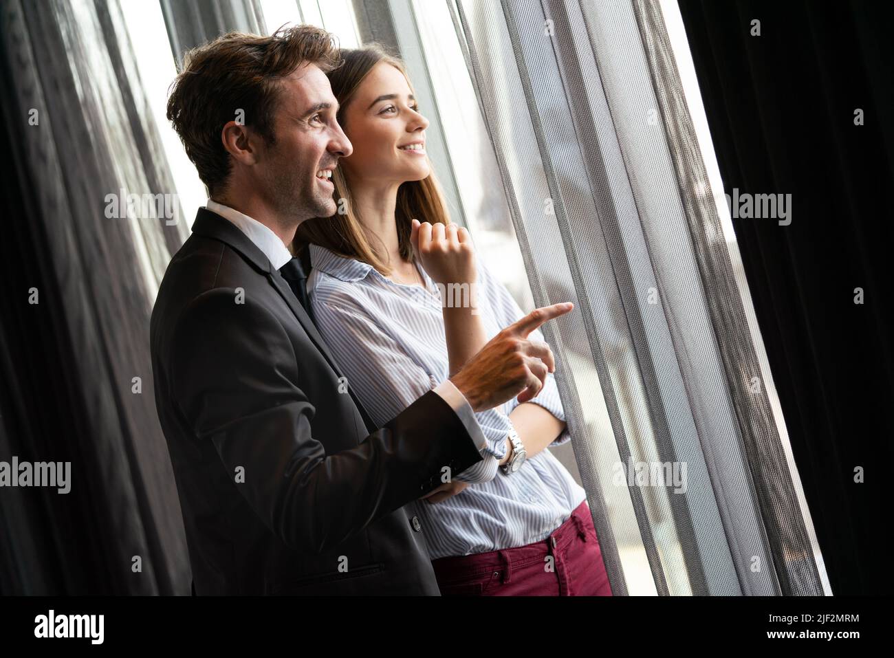 Young loving happy couple have fun smiling and talking Stock Photo
