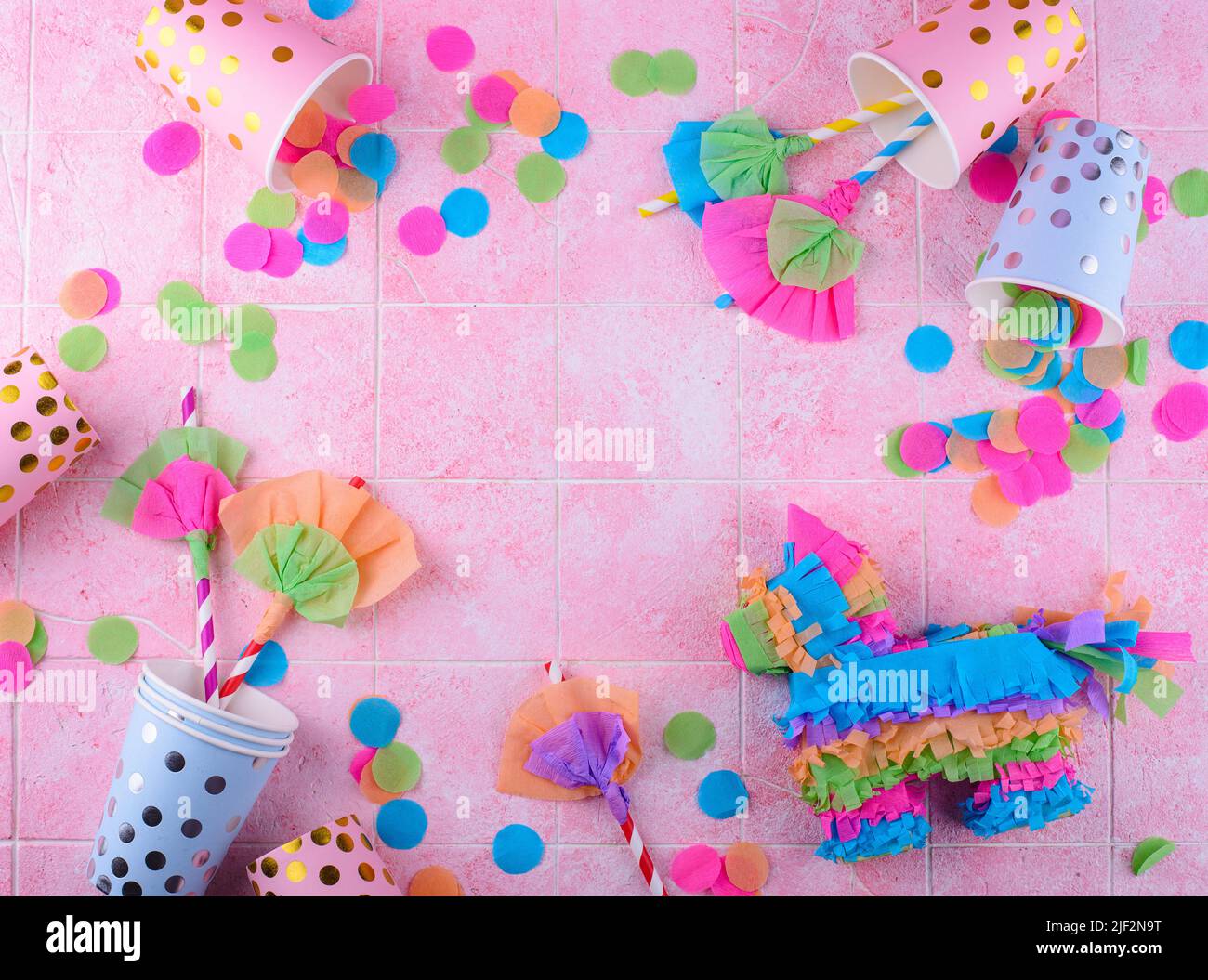 Mexican Paper Flowers and Pinata Stock Photo - Alamy
