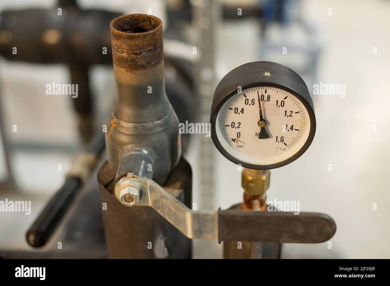 Pressure sensors in the urban heating system. Hot water pipes in an