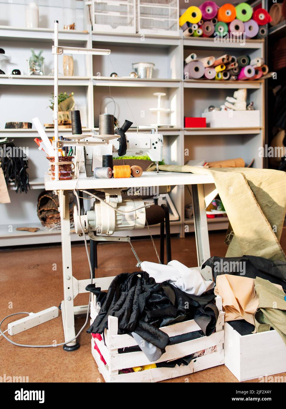 Mess in sewing workshop. Stock Photo