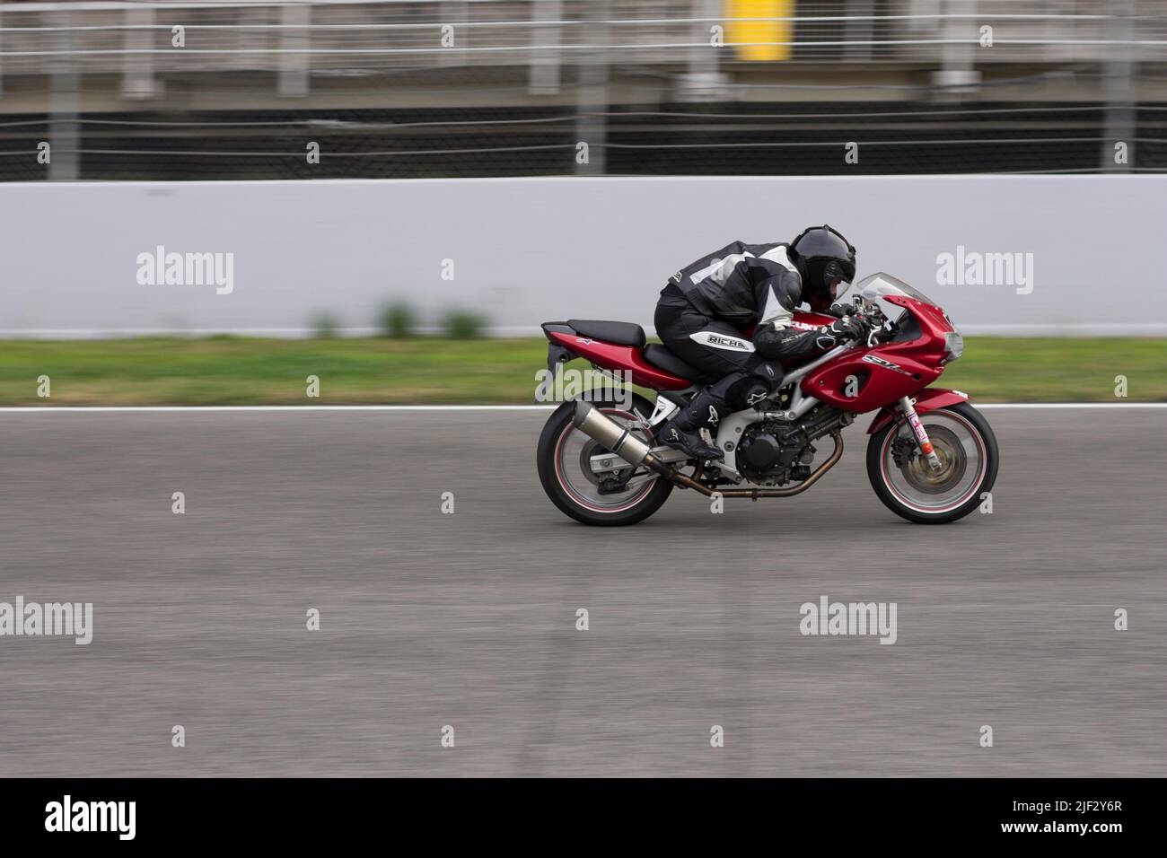 Classic fast sport motorbike in the track. Suzuki SV Stock Photo