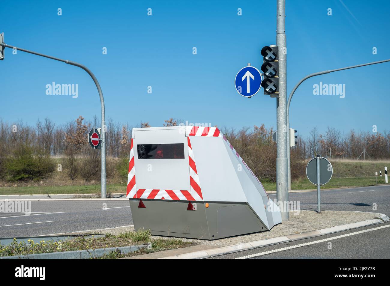 Modern camouflaged speed camera at the crossroads of an expressway Stock Photo