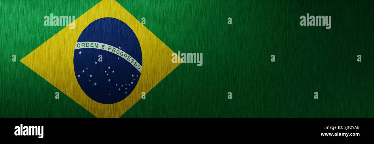 Banner of grunge Brazilian flag. Dirty Brazil flag on a metal surface