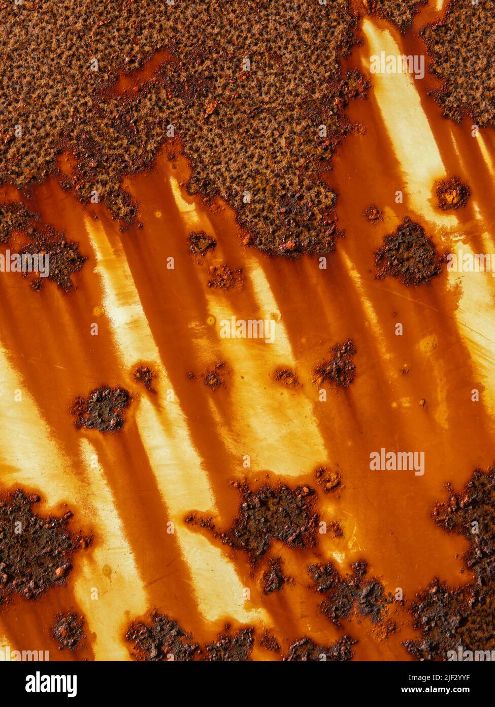 Rusty metal work and orange paint Stock Photo