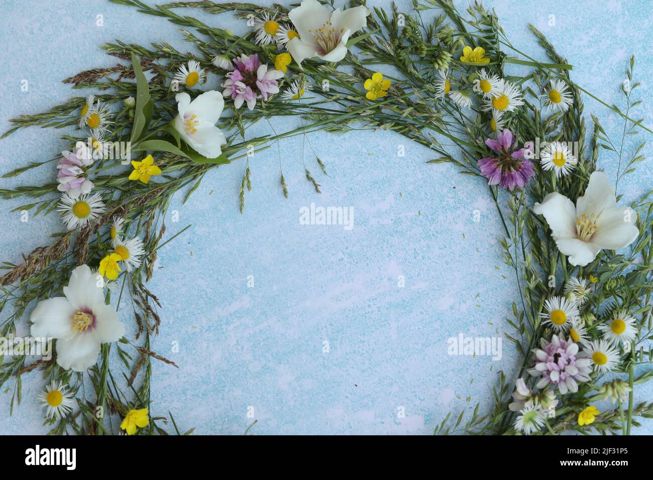 blue background with flowers frame and copy space Stock Photo - Alamy