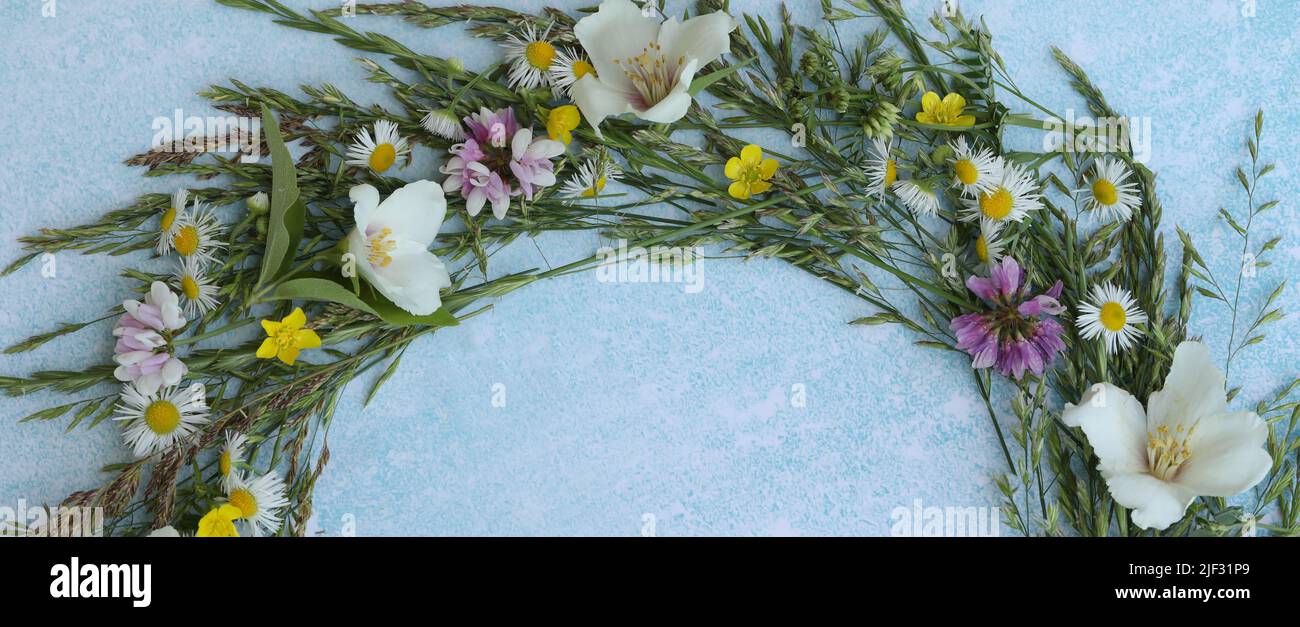 blue background with flowers frame and copy space Stock Photo - Alamy