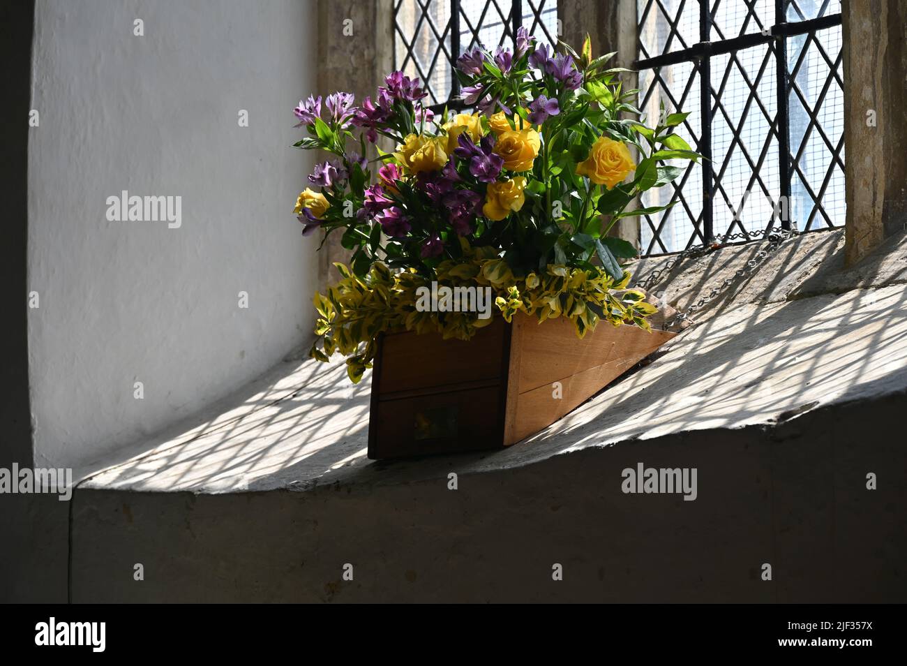 Floral Display in aid of HM The Queen's Platinum Jubilee held over the weekend of 2/6 June 2022 in St Peter's church in the north Oxfordshire village Stock Photo
