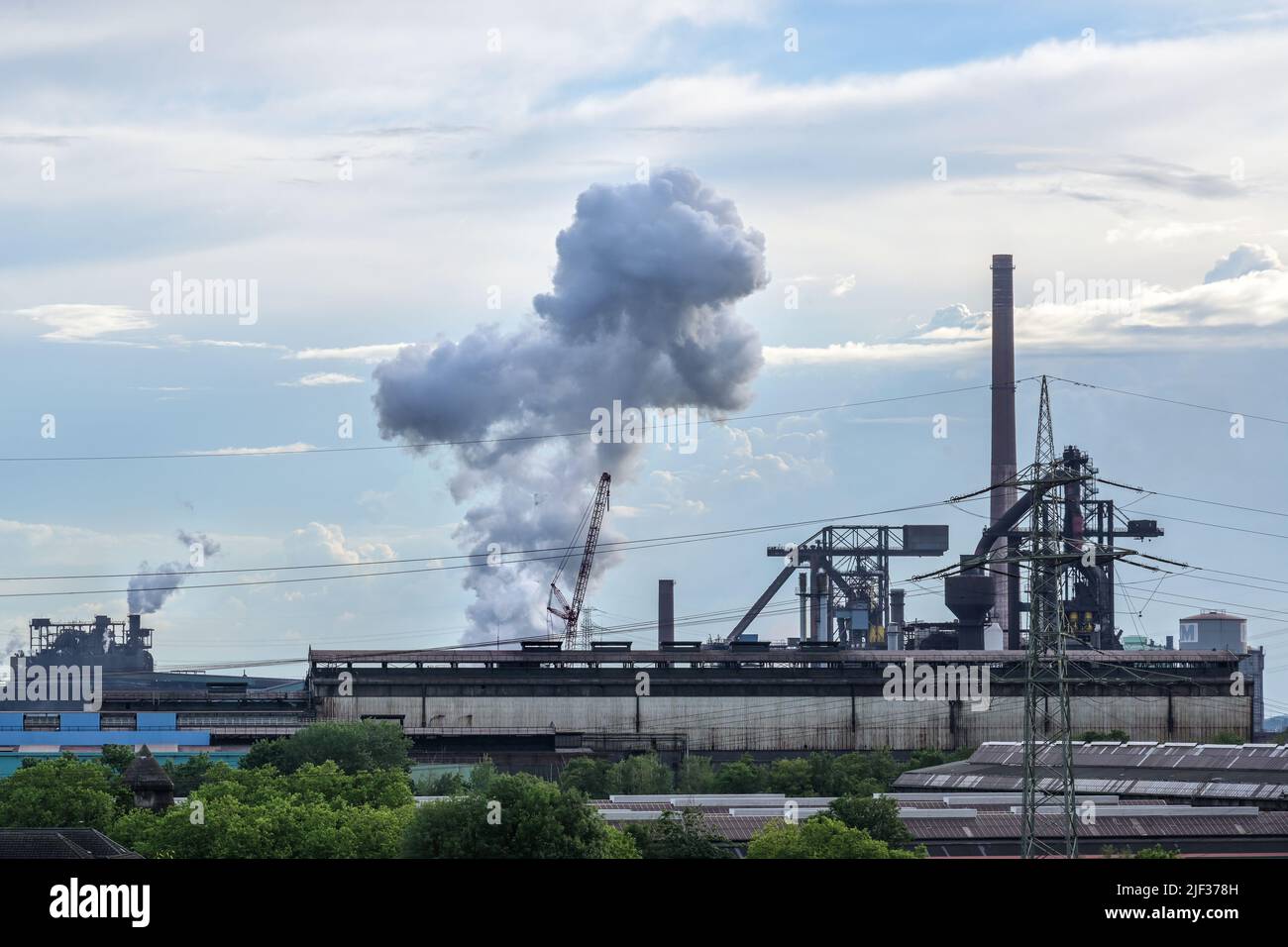 Duisburg, Germany, June 26, 2022: HKM, steelworks Krupp Mannesmann, pollution of heavy industry using fossil energy for steel production, coke oven an Stock Photo