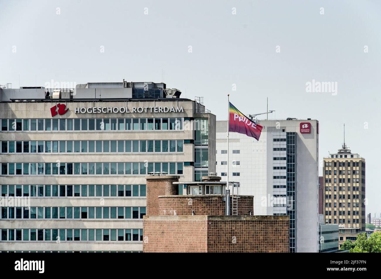 Rotterdam, The Netherlands, June 18, 2022: two buildings of the Hogeschool, with a pride flage on one of them Stock Photo