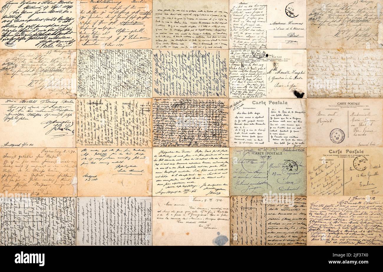 Vintage used paper texture background. Antique postcards. Old handwriting Stock Photo