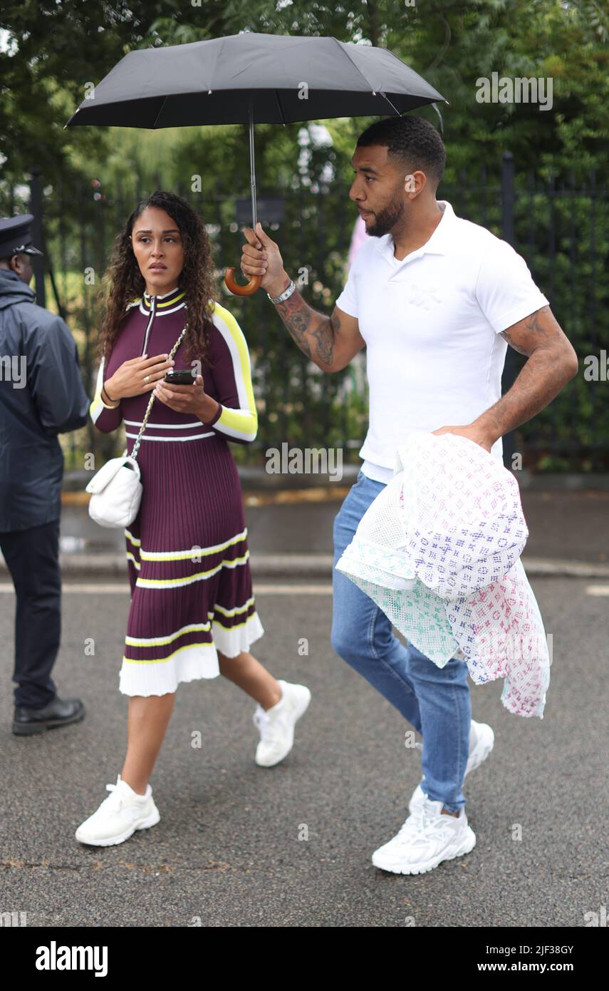 Birmingham City Striker Troy Deeney and Alisha Hosannah arriving at day three of the 2022 Wimbledon Championships at the All England Lawn Tennis and Croquet Club, Wimbledon. Stock Photo
