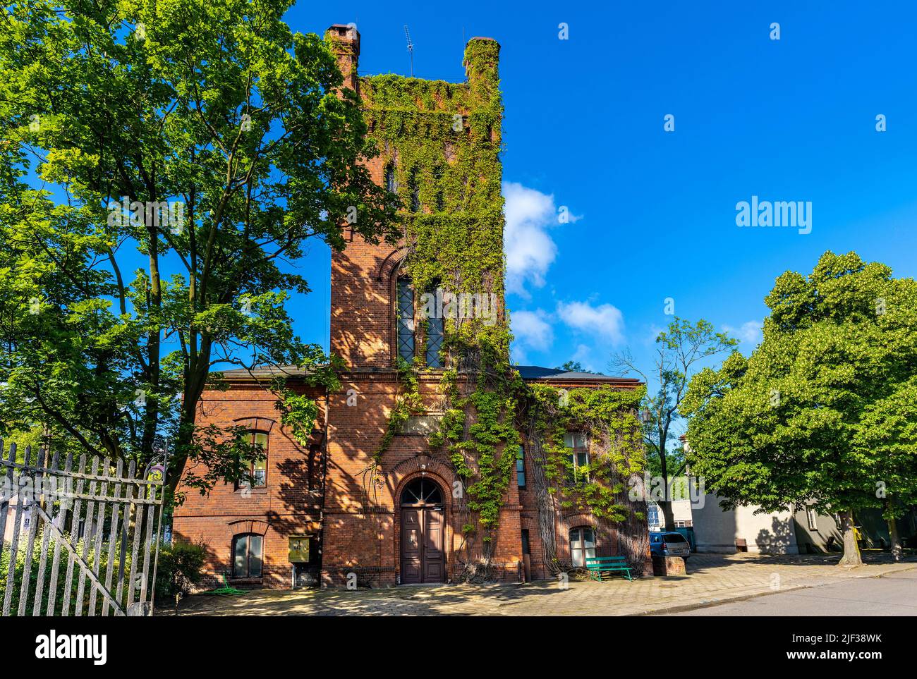 Skierniewice, Poland - June 14, 2022: XIX century brick stronghold with tower of Primate Palace - Palac Prymasowski - within Palace and Park complex Stock Photo