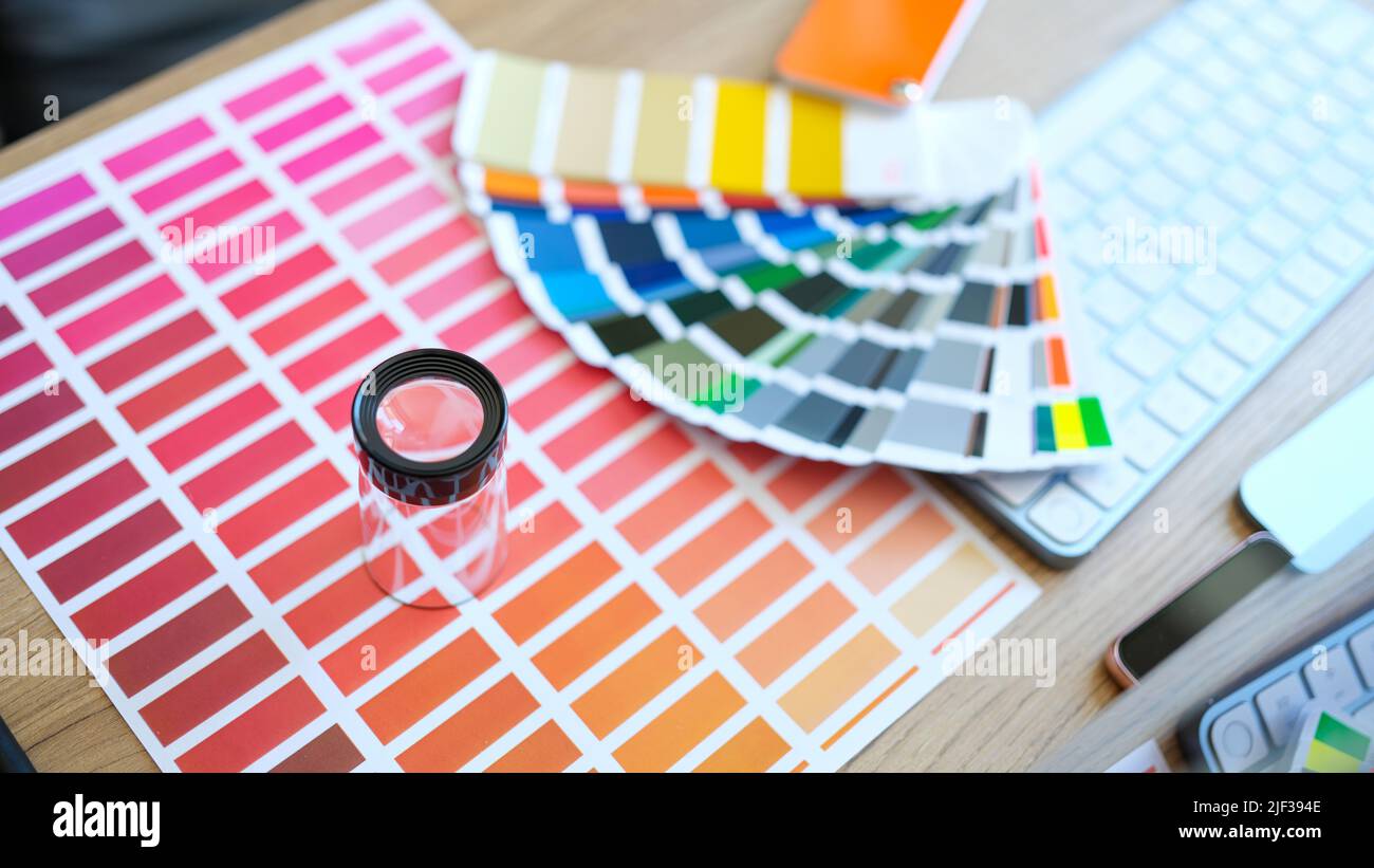 Color palette with different shades of colors and magnifier Stock Photo