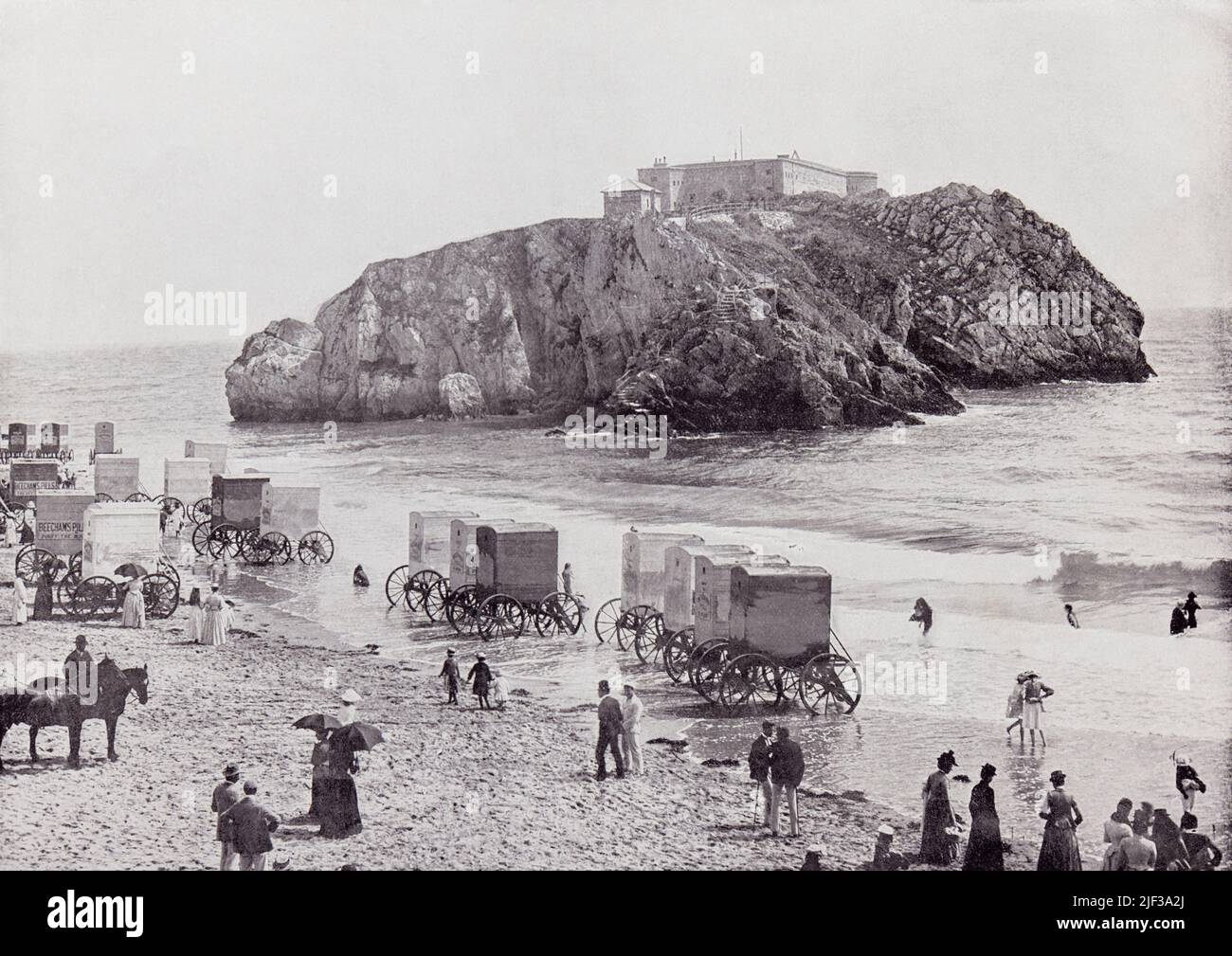 Tenby, Pembrokeshire, Wales.  St. Catherine's Rock and Fort, seen here in the 19th century.  From Around The Coast,  An Album of Pictures from Photographs of the Chief Seaside Places of Interest in Great Britain and Ireland published London, 1895, by George Newnes Limited. Stock Photo