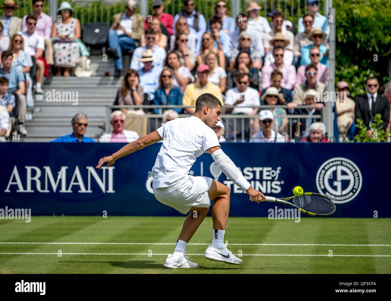 London, UK. 25th June, 2022. Carlos Alcaraz plays closes in on the net  during the Giorgio Armani Tennis Classic at the Hurlingham Club, London, UK  on 25 June 2022. Photo by Phil