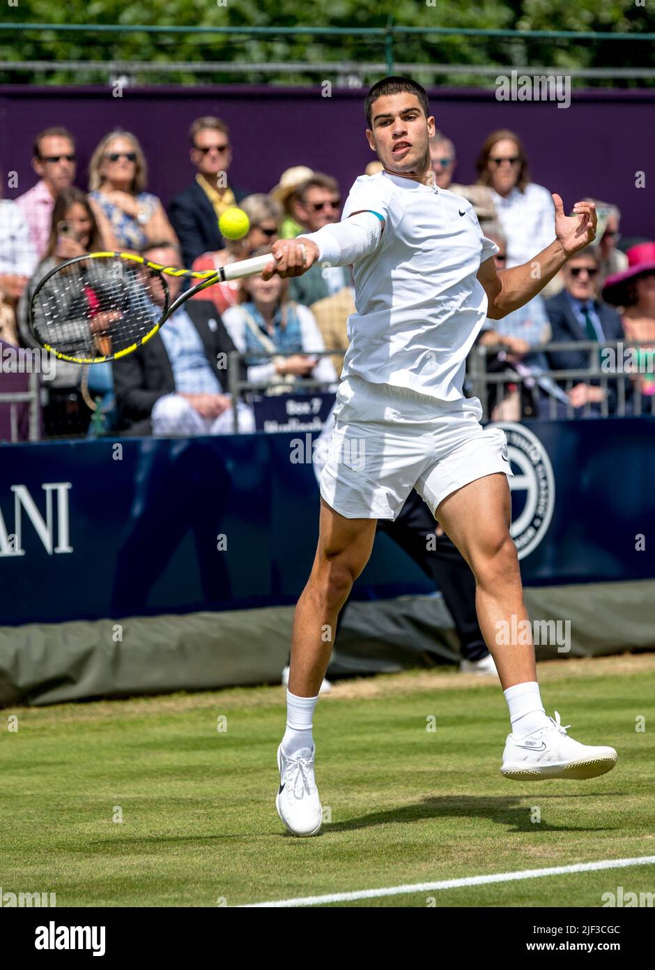 Carlos Alcaraz plays a forehand shot during the Giorgio Armani Tennis Classic at the Hurlingham Club, London, UK on 25 June 2022
