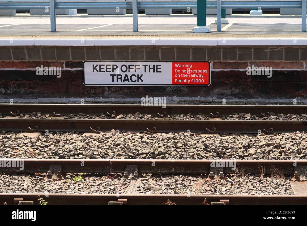 Keep off the track sign at Carlisle Citadel station. Stock Photo
