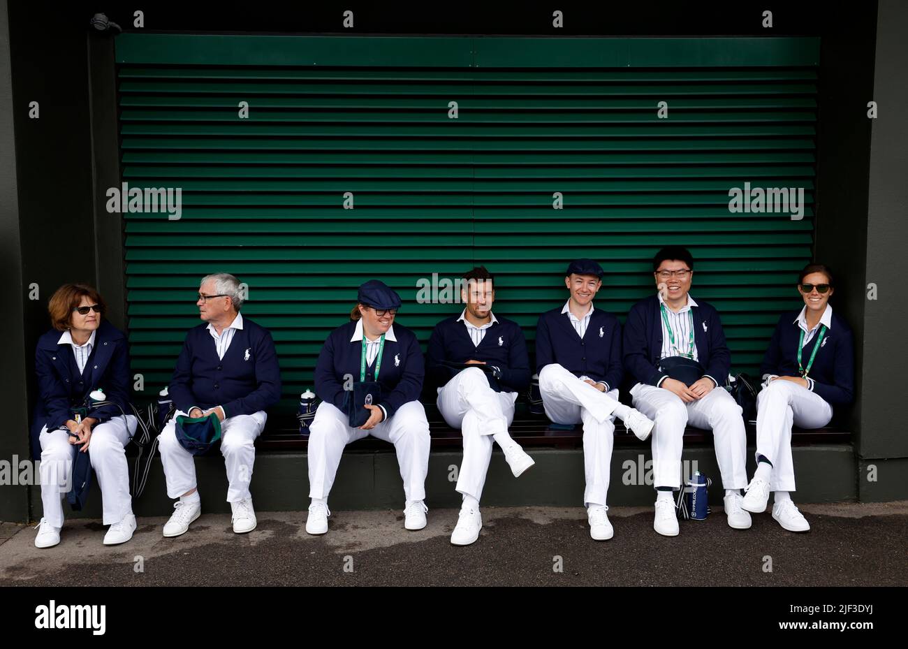 Line judges wait to go on to Court Two during day three of the 2022 Wimbledon