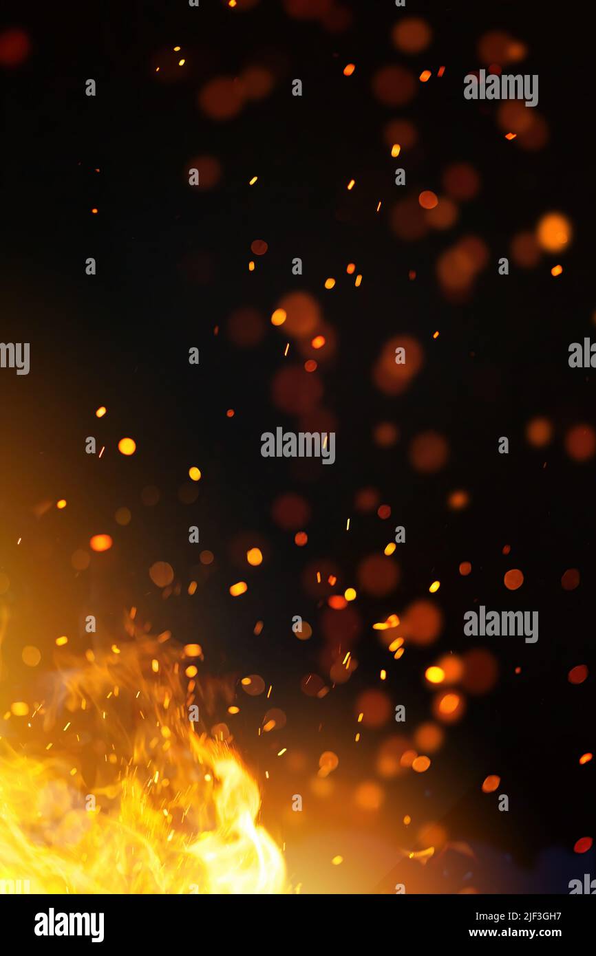 abstract fire flames with sparks on a black background Stock Photo - Alamy