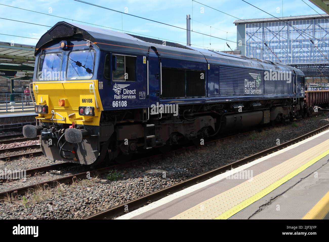 DRS class 66 locomotive No 66108 standing in the centre line at Carlisle Citadel station with a short freight train on 15th June 2022. Stock Photo