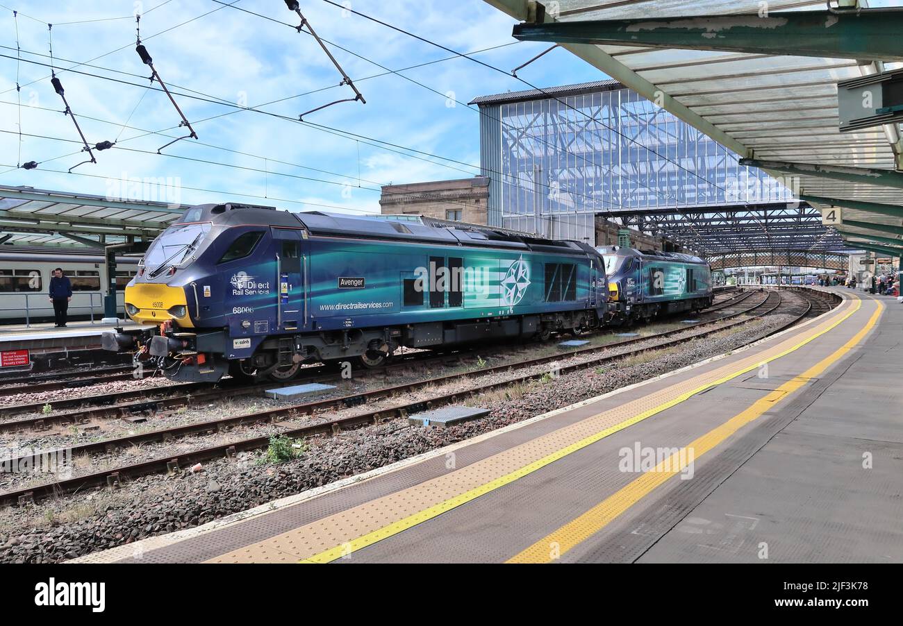 DRS class 68 locomotives Nos 68008 Avenger and 68009 Titan standing in the centre line at Carlisle Citadel station. Stock Photo