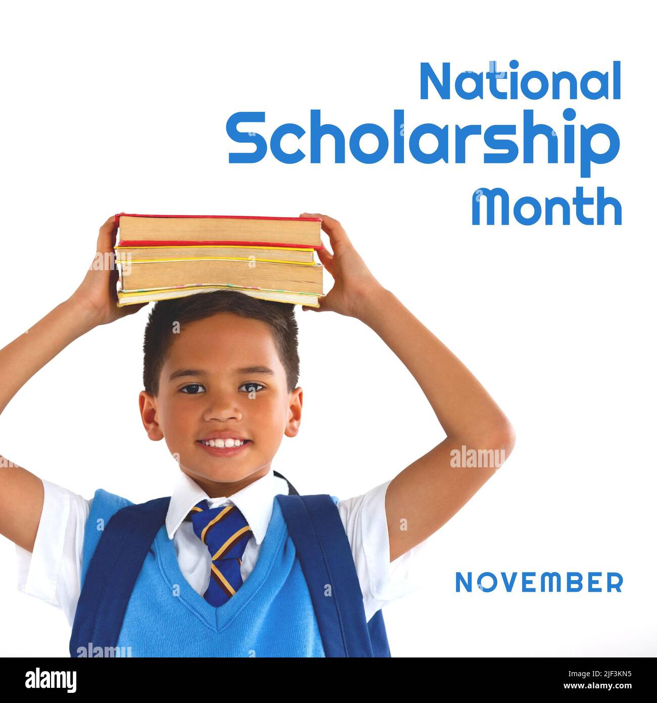 Composite of biracial boy carrying books on head and national scholarship month, november text Stock Photo