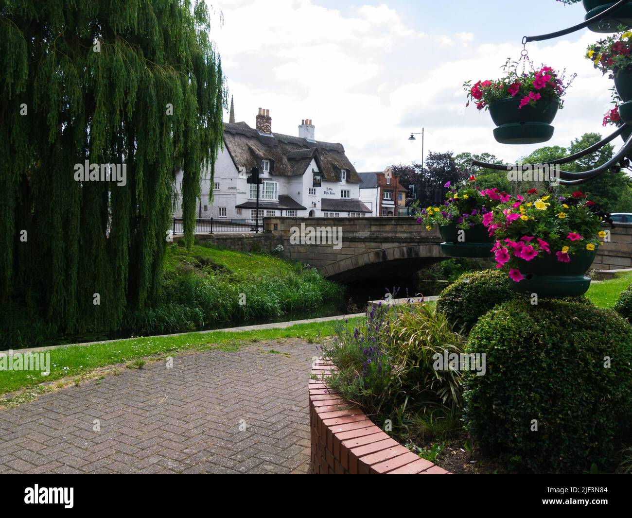 View across River Welland road bridge towards Ye Olde White Horse Inn built in 1553 by William Willesby and called Bergry House Churchgate Spalding Li Stock Photo