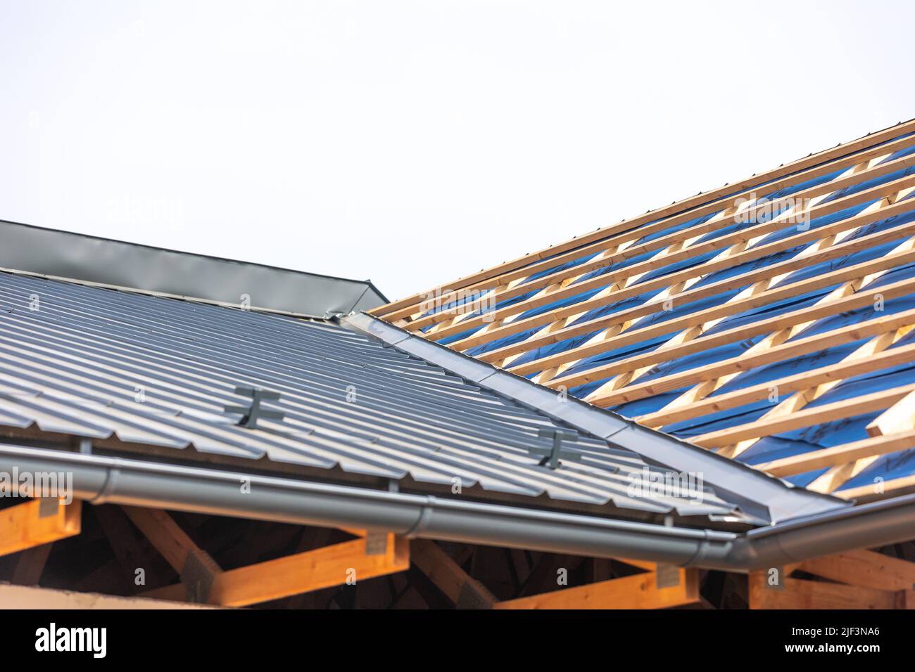 Roof construction on a new building, extremely high prices of building