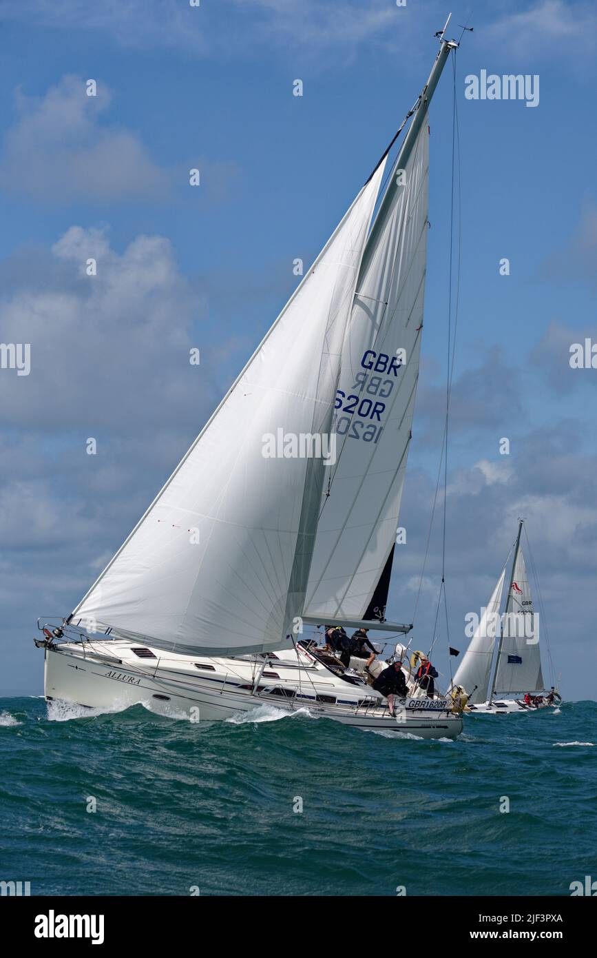 Fantastic condtions for sailboat racing as these two yachts Allura and Luella 2 are finding out, as they compete in the Round The Island race. Stock Photo