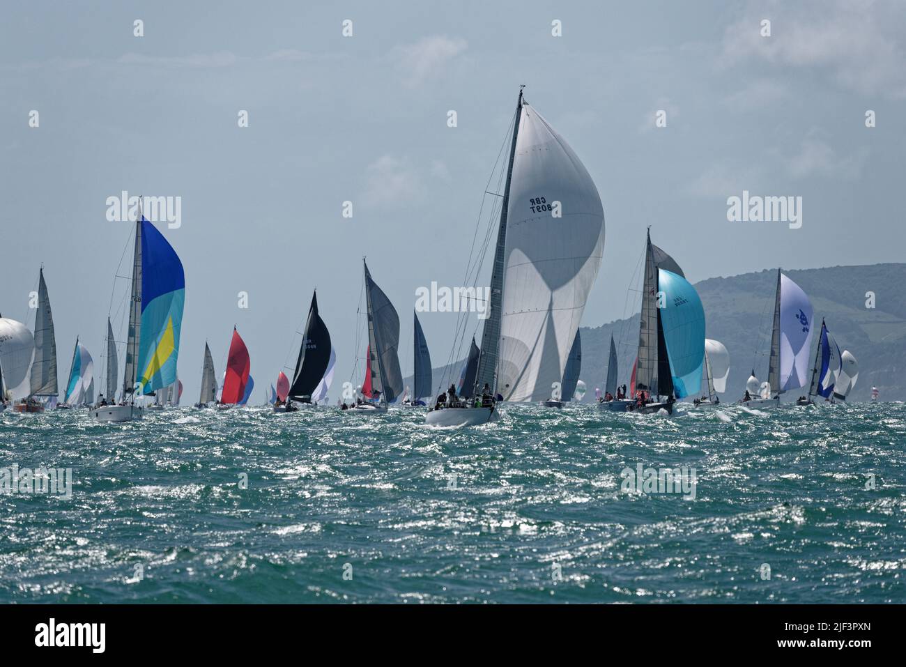 A veritable armada of sailing yachts competing in the Isle of Wight Sailing Club's annual Round The Island Race Stock Photo
