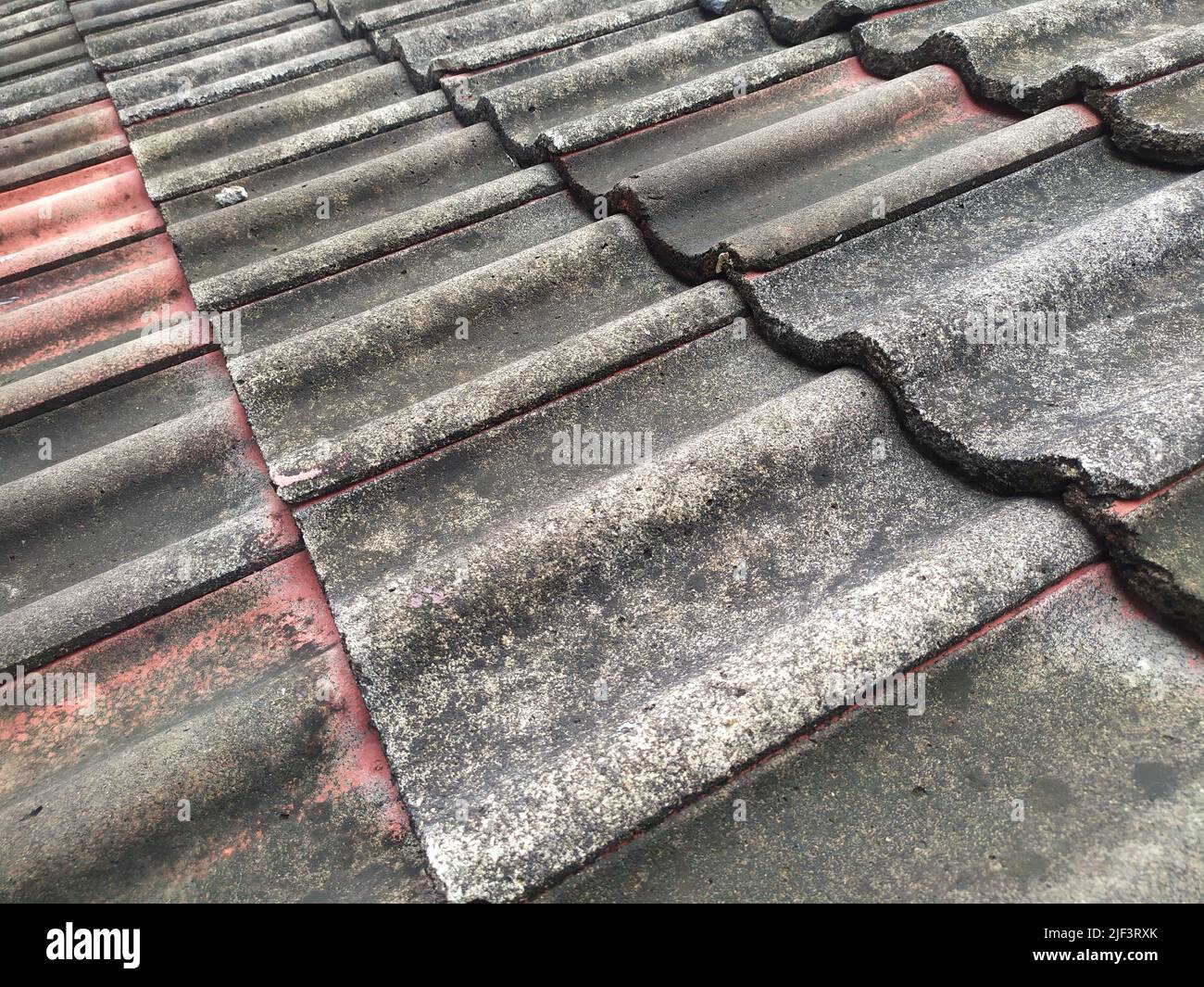 Roof tile is a component of the roof covering the upper surface consisting of overlapping parts Stock Photo