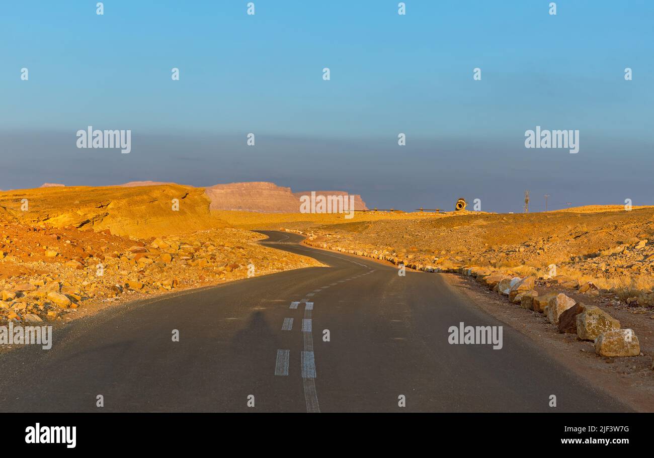 beautiful road at sunset in Negev desert Israel Stock Photo