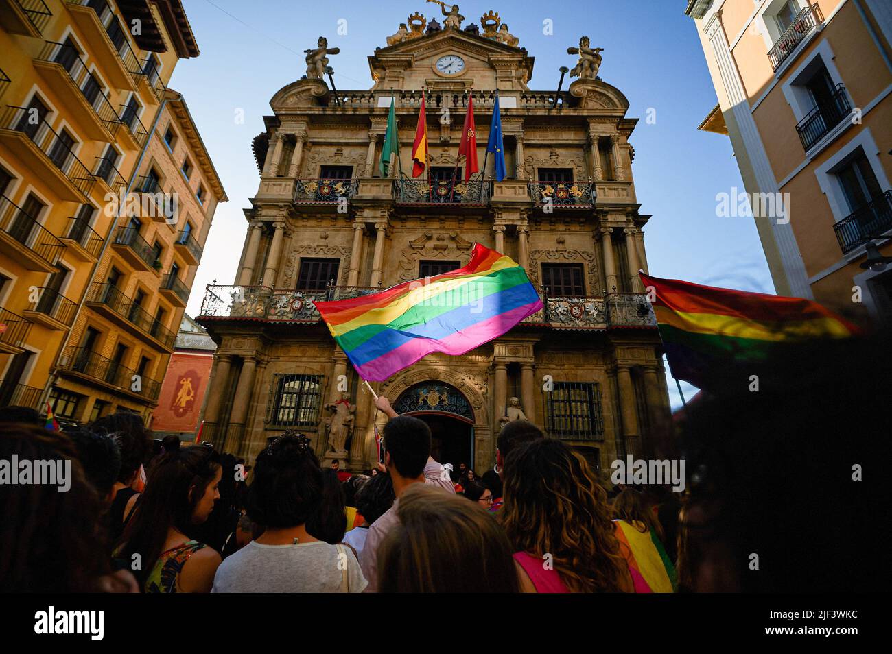 Pamplona, Spain. 28th June, 2022. Demonstrators celebrate with flags during the Gay Parade on the streets of Pamplona. Hundreds of people demonstrated through the streets of Pamplona, on the occasion of the celebration of Gay Pride, drag queens, flags flowed on the streets in vindication of the rights of the LGTBQ   collective. Credit: SOPA Images Limited/Alamy Live News Stock Photo