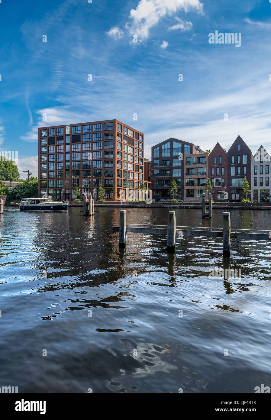 Canal-side living in the beautiful city of Haarlem, west of Amsterdam in The Netherlands. Stock Photo