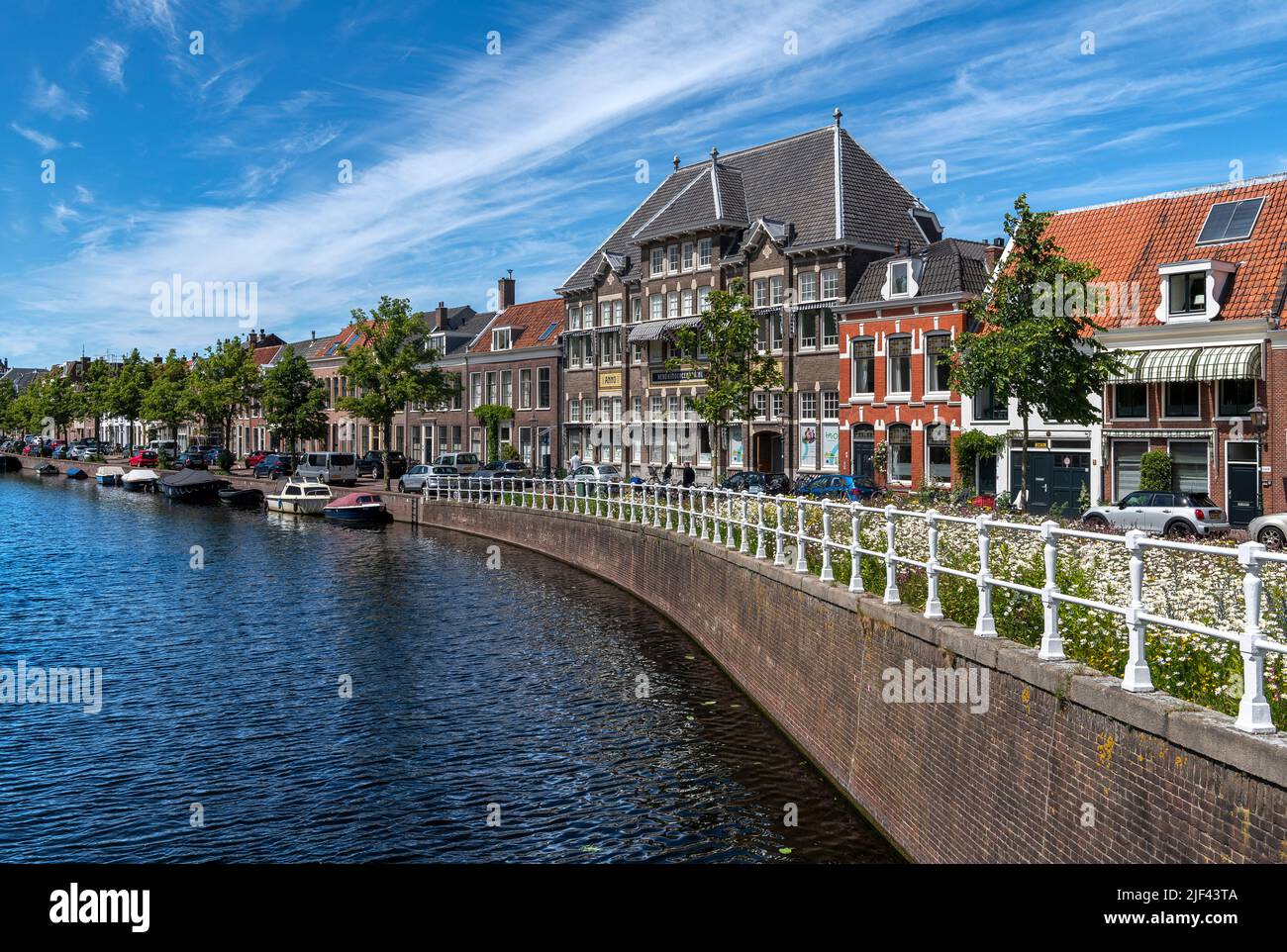 Canal-side living in the beautiful city of Haarlem, west of Amsterdam in The Netherlands. Stock Photo