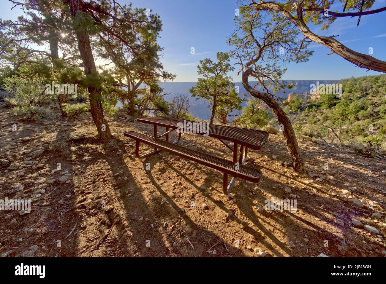 A lone picnic table just east of Shoshone Point at Grand Canyon Arizona. Public Park, no property release needed. Stock Photo