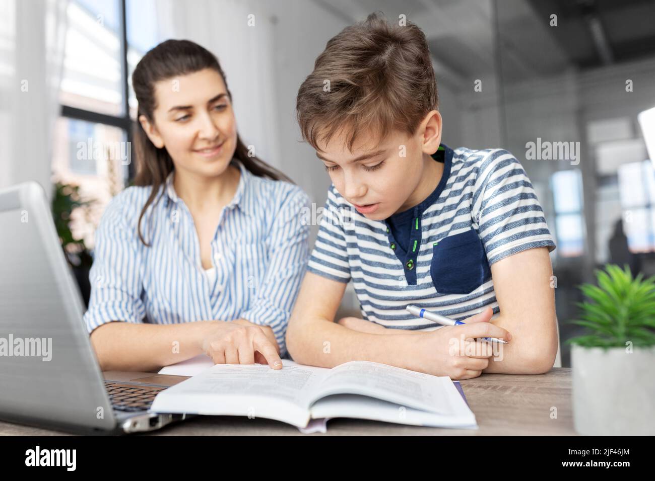 mother and son doing homework together Stock Photo - Alamy