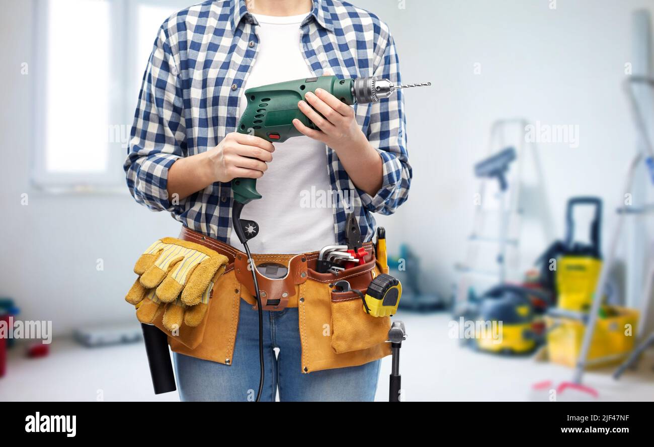 Woman drill tool hi-res stock photography and images - Alamy