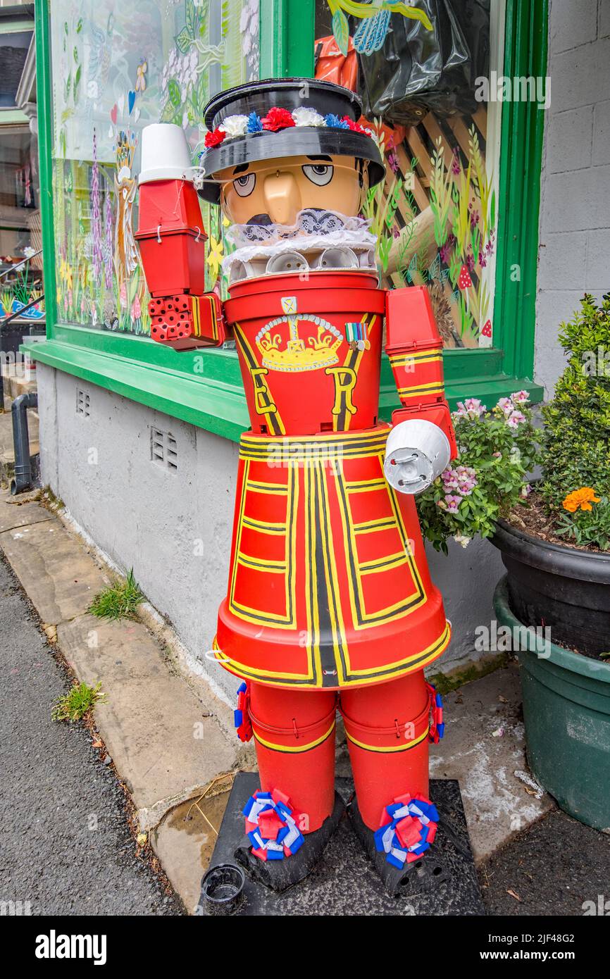 Settle Flowerpot Festival 2022 takes place throughout July & August. This Yeoman must be taking a break from the Tower of London Stock Photo