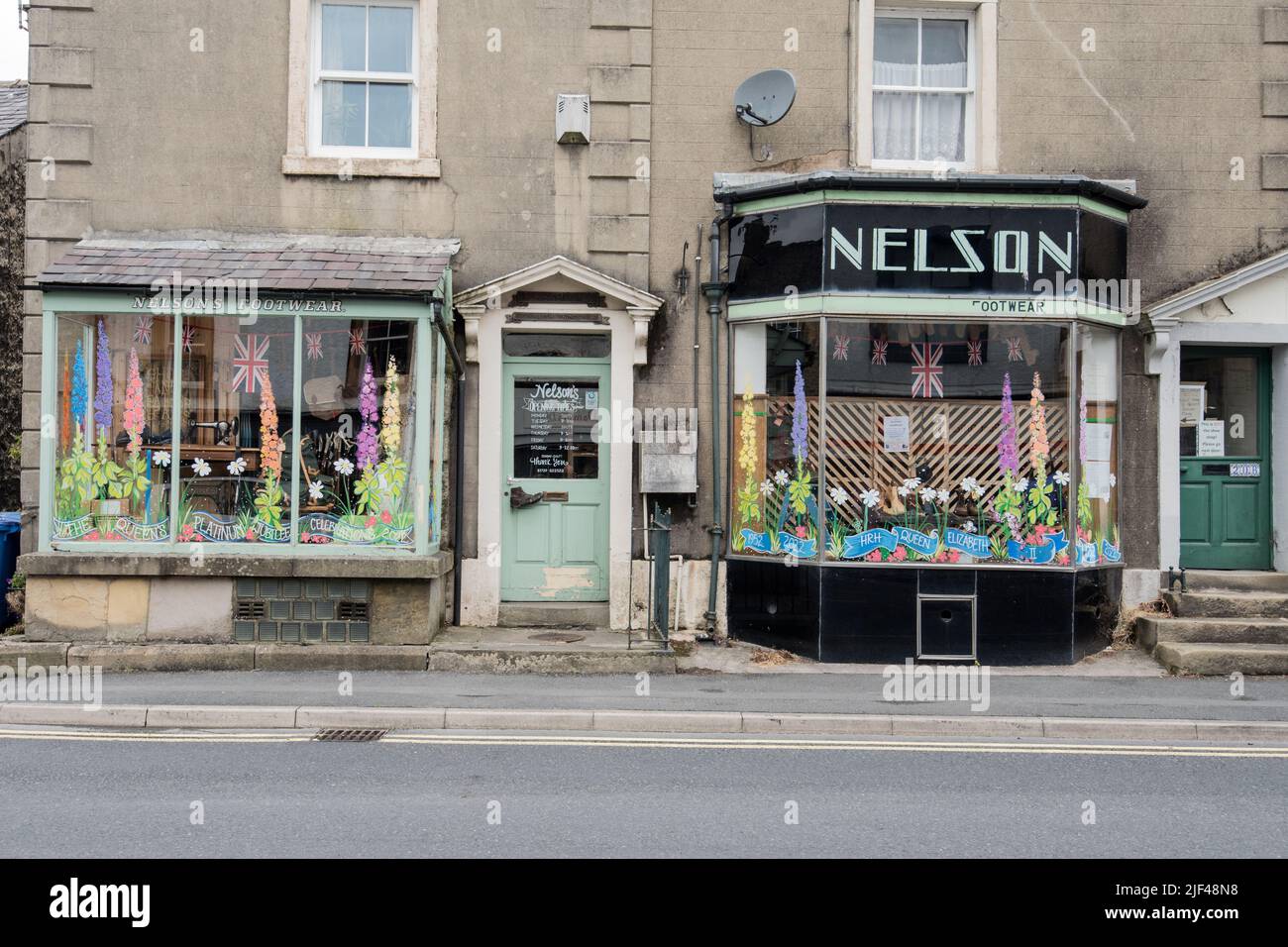 Check out these decorated shop premises in the Queen's Jubilee Year perhaps while you are at the Flowerpot Festival in Settle July & August 2022. Stock Photo