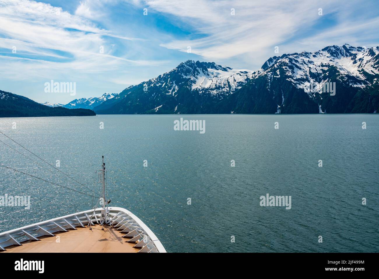 Bow of cruise ship sailing down the Prince William Sound away from Valdez in Alaska Stock Photo