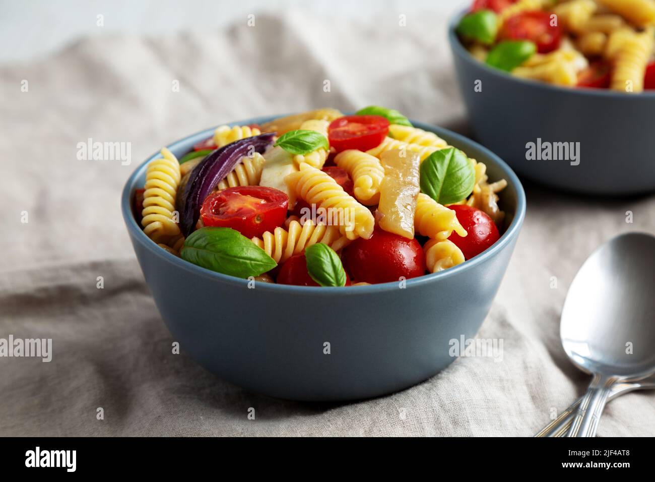 Homemade Fusilli Pasta Salad with Mozzarella and Vegetables, side view