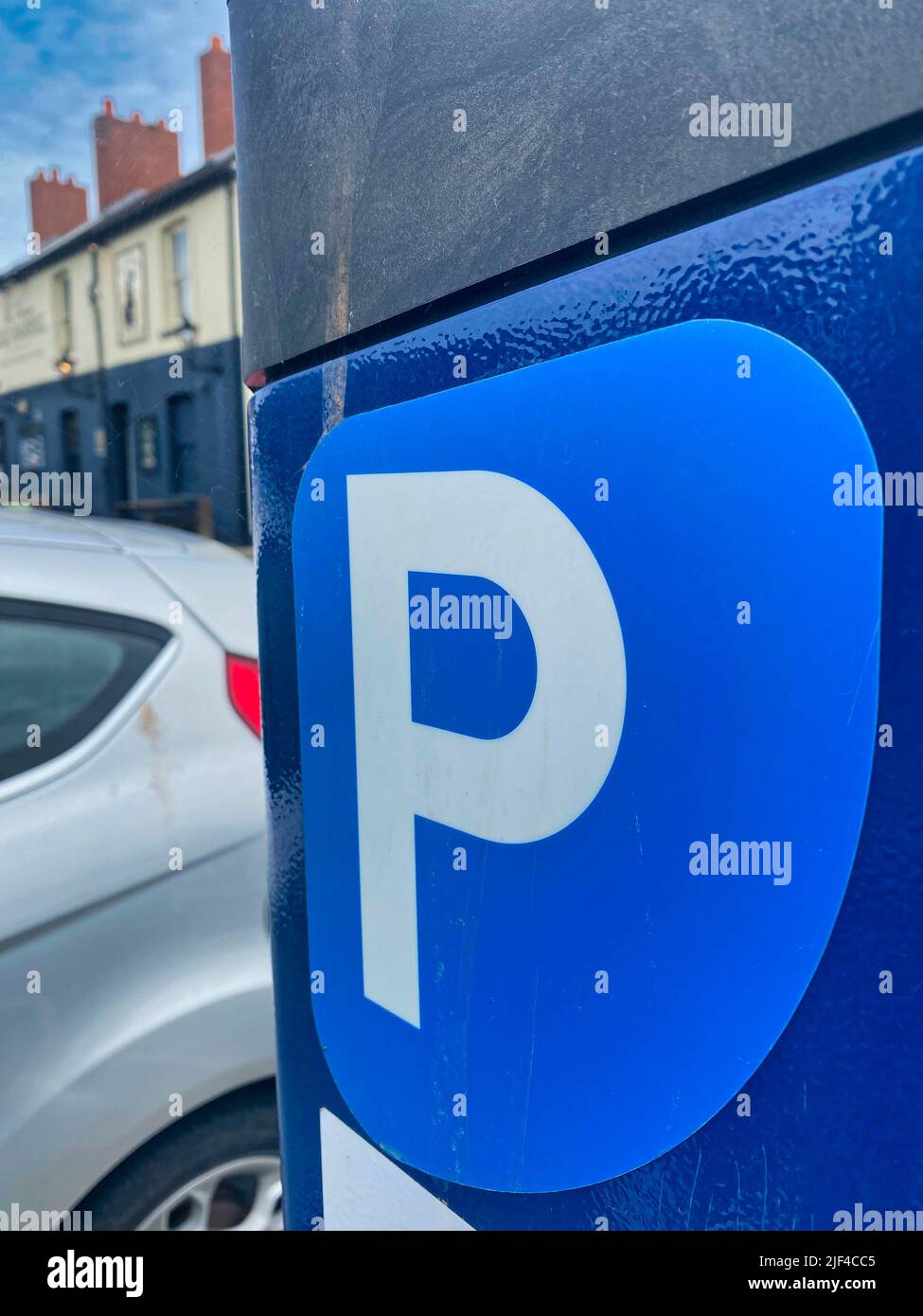 Parking meter in a car park Stock Photo Alamy