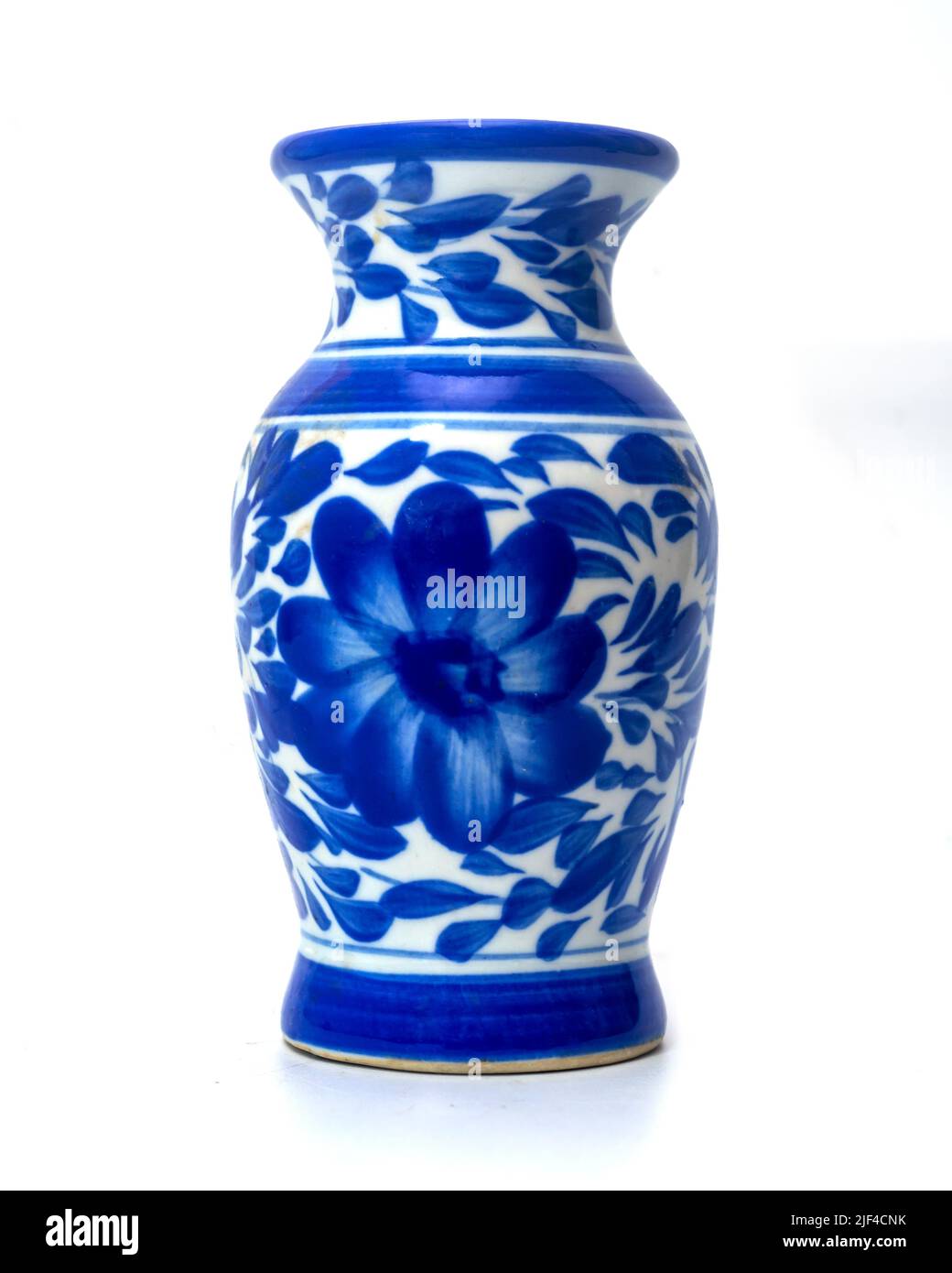 Chinese blue white ceramic vase for flowers on a white background Stock