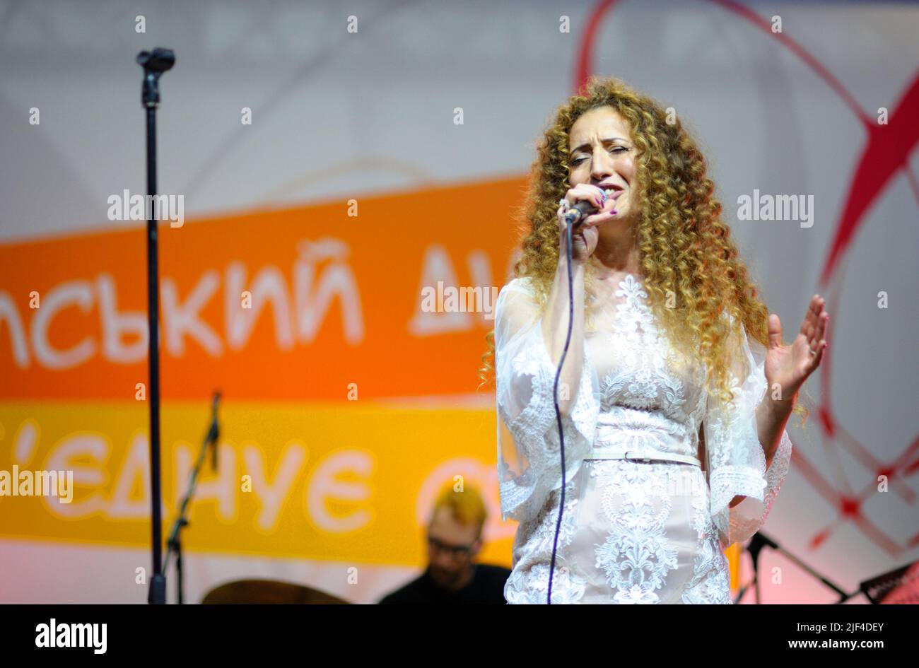 Famous Crimean Tartar singer Aysel Balich singing on stage. Concert of Crimean Tartar music. October 23, 2018. Kyiv, Ukraine Stock Photo