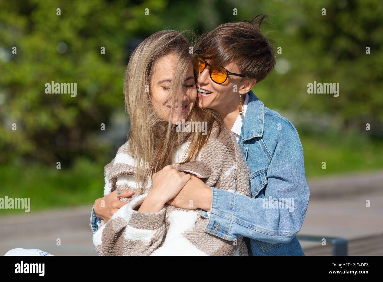Love and relationships concept. Lesbian couple enjoy each other. Beautiful romantic moment between two female lovers. Stock Photo