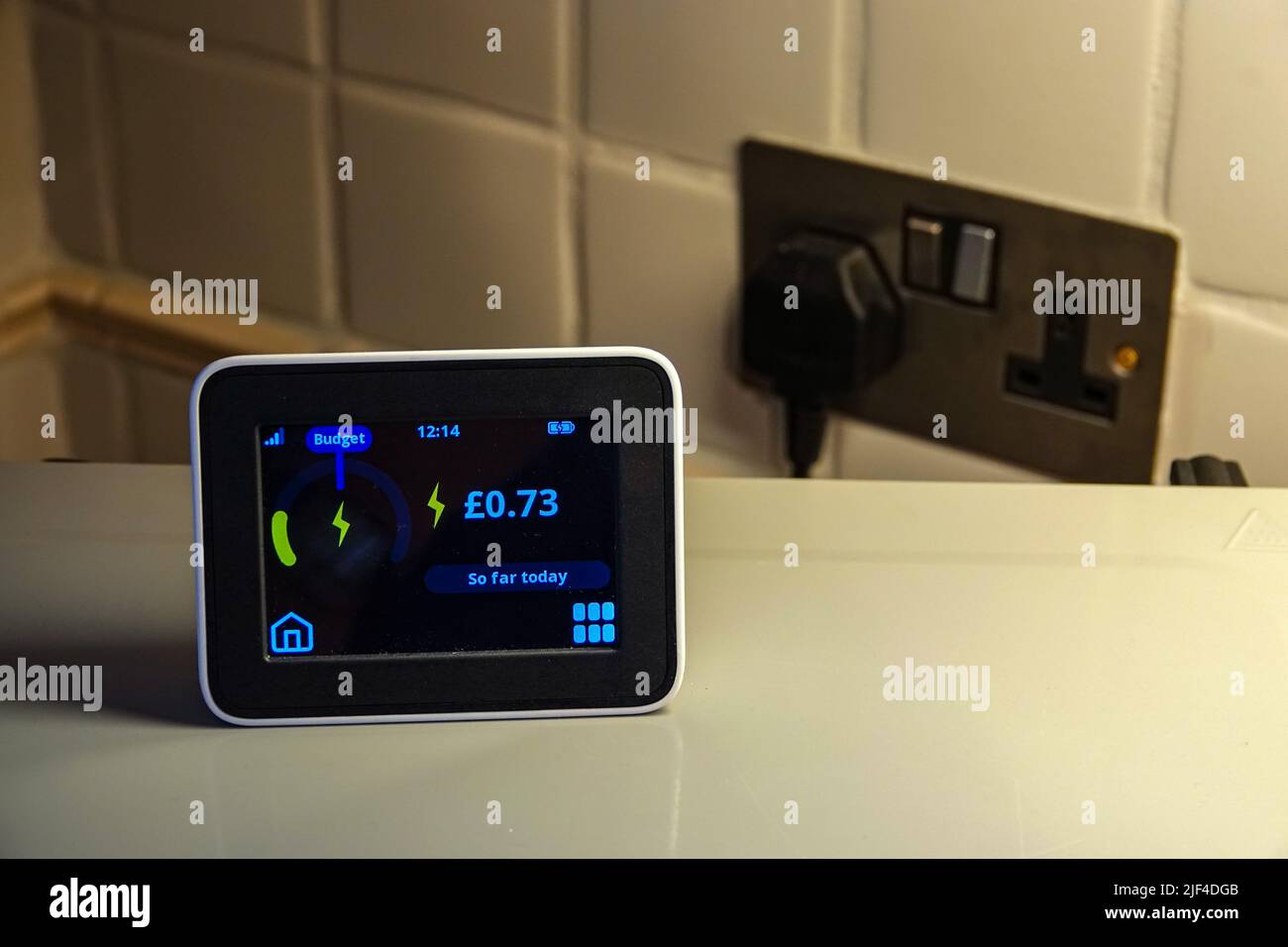 An electricity smart-meter, checking electricity usage, UK Stock Photo