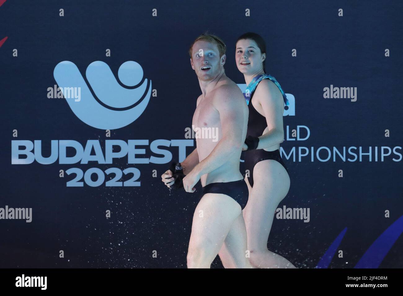 Budapest, Hungary. 29th June, 2022. Andrea Spendolini Sirieix (R)/James Heatly of Britain react after the mixed 3m&10m team final of diving at the 19th FINA World Championships in Budapest, Hungary, June 29, 2022. Credit: Zheng Huansong/Xinhua/Alamy Live News Stock Photo