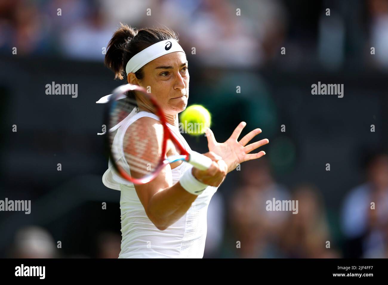 France's Caroline Garcia in action against Great Britain's Emma